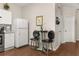 Kitchen breakfast nook with two chairs and a view of hallway at 2361 Silver Palm Dr, Kissimmee, FL 34747