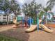 Colorful playground with two slides at 2361 Silver Palm Dr, Kissimmee, FL 34747