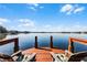 Peaceful lakefront dock with seating, offering serene waterfront views at 2810 Lake Howell Ln, Winter Park, FL 32792