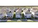 Row of townhouses viewed from above, showcasing the community layout at 4704 Homestead Trl, St Cloud, FL 34772