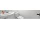 Clean bathroom with white sink and toilet at 4704 Homestead Trl, St Cloud, FL 34772