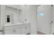 Modern bathroom with double vanity and a separate room at 4704 Homestead Trl, St Cloud, FL 34772