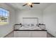 Bedroom with king-size bed and window at 4704 Homestead Trl, St Cloud, FL 34772