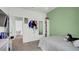 Charming bedroom with green wall and built-in closet at 4704 Homestead Trl, St Cloud, FL 34772
