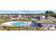 Community pool and clubhouse with surrounding landscaping at 4704 Homestead Trl, St Cloud, FL 34772