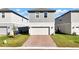 Two-car garage with brick paver driveway at 4704 Homestead Trl, St Cloud, FL 34772