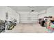 Large garage with an automatic door and extra storage at 4704 Homestead Trl, Saint Cloud, FL 34772