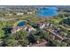 Aerial view showcasing community location near a lake and other residences at 7135 Yacht Basin Ave # 237, Orlando, FL 32835