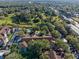 Aerial view of apartment buildings and green space at 7135 Yacht Basin Ave # 237, Orlando, FL 32835