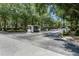 Gated community entrance with security access at 7135 Yacht Basin Ave # 237, Orlando, FL 32835