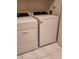 Stackable Whirlpool washer and dryer in laundry closet at 7135 Yacht Basin Ave # 237, Orlando, FL 32835
