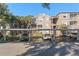 Covered parking area with assigned parking spaces at 7135 Yacht Basin Ave # 237, Orlando, FL 32835
