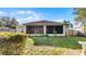 Home exterior view with screened patio at 2441 Derby Dr, Deltona, FL 32738