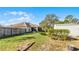 Backyard with shed and partial home view at 2441 Derby Dr, Deltona, FL 32738