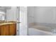 Bathroom features a bathtub, vanity, and tiled floors at 2441 Derby Dr, Deltona, FL 32738