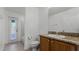 Bathroom with single sink vanity and shower at 2441 Derby Dr, Deltona, FL 32738