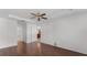 Large bedroom with wood floors and en-suite bathroom access at 2441 Derby Dr, Deltona, FL 32738