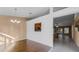 Dining room with hardwood floors and kitchen pass-through at 2441 Derby Dr, Deltona, FL 32738