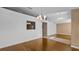 Bright dining room with hardwood floors and elegant chandelier at 2441 Derby Dr, Deltona, FL 32738