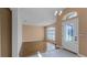Dining area with hardwood floors and adjacent kitchen view at 2441 Derby Dr, Deltona, FL 32738