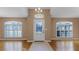 Bright entryway with hardwood floors and a chandelier at 2441 Derby Dr, Deltona, FL 32738