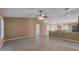Spacious living room with tile floors and ceiling fan at 2441 Derby Dr, Deltona, FL 32738
