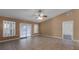 Living area with tile floors and sliding glass doors at 2441 Derby Dr, Deltona, FL 32738