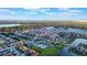 Aerial view of community with pool and lake at 2609 Mead Ave, St Cloud, FL 34771