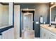 Bathroom with double vanity and walk-in shower at 2609 Mead Ave, St Cloud, FL 34771