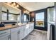 Spa-like bathroom with granite countertops and walk-in shower at 2609 Mead Ave, St Cloud, FL 34771