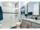 Bathroom with granite vanity and glass shower at 2609 Mead Ave, St Cloud, FL 34771