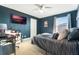 Bedroom with window, TV and work area at 2609 Mead Ave, St Cloud, FL 34771