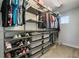 Large walk-in closet with ample shelving and drawers at 2609 Mead Ave, St Cloud, FL 34771