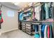 Well-organized closet with hanging rods and shoe storage at 2609 Mead Ave, Saint Cloud, FL 34771