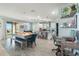 Open kitchen features a large island and dining area with pool table at 2609 Mead Ave, St Cloud, FL 34771