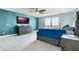 Main bedroom with king-size bed and water views at 2609 Mead Ave, St Cloud, FL 34771