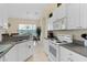 Spacious kitchen with ample cabinet space and breakfast bar at 404 Brunello Dr, Davenport, FL 33897