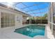 Inviting pool and spa with patio furniture at 404 Brunello Dr, Davenport, FL 33897
