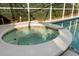 Relaxing private spa adjacent to the pool at 404 Brunello Dr, Davenport, FL 33897