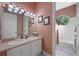 Bathroom with double sinks and a separate shower and tub at 1178 Black Walnut Ct, Winter Springs, FL 32708