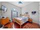 Spacious bedroom with hardwood floors and a large window at 1178 Black Walnut Ct, Winter Springs, FL 32708