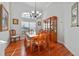 Formal dining room with hardwood floors and a china cabinet at 1178 Black Walnut Ct, Winter Springs, FL 32708