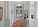 Bright and airy entryway with a patterned rug and decorative elements at 1178 Black Walnut Ct, Winter Springs, FL 32708