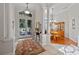 Spacious entryway with a view into the dining room at 1178 Black Walnut Ct, Winter Springs, FL 32708