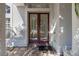 Inviting entryway with double doors and a tiled porch at 1178 Black Walnut Ct, Winter Springs, FL 32708