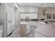Spacious kitchen featuring an island, ample cabinetry, and modern appliances at 1178 Black Walnut Ct, Winter Springs, FL 32708