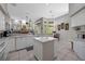 Bright kitchen with an island, breakfast nook, and view to Gathering room at 1178 Black Walnut Ct, Winter Springs, FL 32708