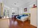 Spacious main bedroom with hardwood floors, plantation shutters and a sitting area at 1178 Black Walnut Ct, Winter Springs, FL 32708