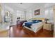 Large main bedroom with hardwood floors, plantation shutters and en-suite bathroom at 1178 Black Walnut Ct, Winter Springs, FL 32708