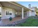 Spacious covered patio with tile flooring, ceiling fan and outdoor seating at 1178 Black Walnut Ct, Winter Springs, FL 32708